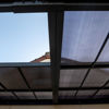 Immagine di Pergola misure mt.3,00x4,00 h.2,43/2,84 addossata in alluminio tetto a pannelli rimovibili art.TT 3040 CL